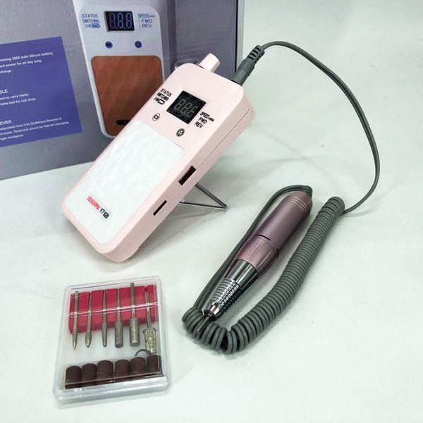 Портативный Фрезер для ногтей Nail Drill YT-928 аккумуляторный с индикатором заряда на 35 000 оборотов. Цвет: розовый 00015501 фото