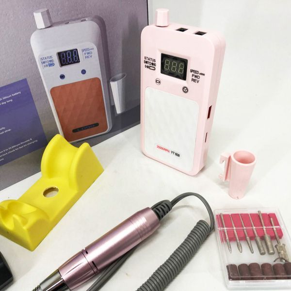 Портативный Фрезер для ногтей Nail Drill YT-928 аккумуляторный с индикатором заряда на 35 000 оборотов. Цвет: розовый 00015501 фото