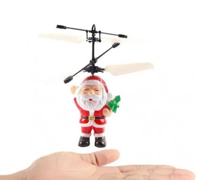 Літаюча іграшка Flying Santa літаючий Дід Мороз Cанта Клаус 00015878 фото