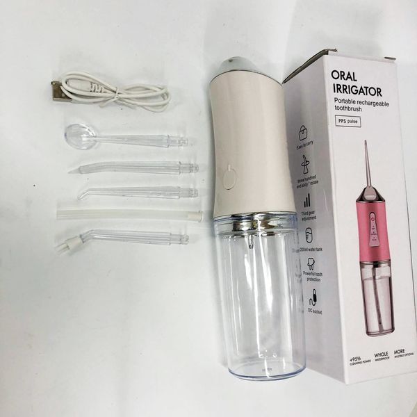 Ирригатор для чистки зубов и полости рта oral irrigator с аккумулятором и сменными насадками. цвет: белый 00014507 фото