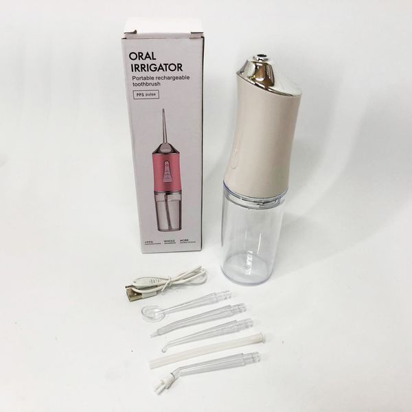 Ирригатор для чистки зубов и полости рта oral irrigator с аккумулятором и сменными насадками. цвет: белый 00014507 фото