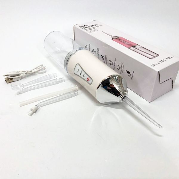 Ирригатор для чистки зубов и полости рта oral irrigator с аккумулятором и сменными насадками. цвет: белый 00014507 фото