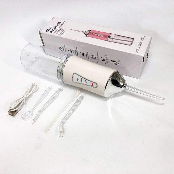 Ирригатор для чистки зубов и полости рта oral irrigator с аккумулятором и сменными насадками. цвет: белый 00014507 фото