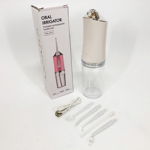 Ирригатор для чистки зубов и полости рта oral irrigator с аккумулятором и сменными насадками. цвет: белый 00014507 фото