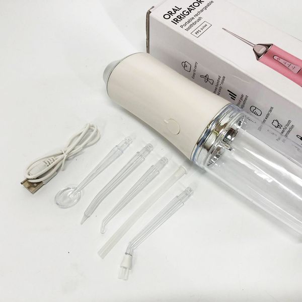 Ирригатор для чистки зубов и полости рта oral irrigator с аккумулятором и сменными насадками. цвет: белый 00014507 фото