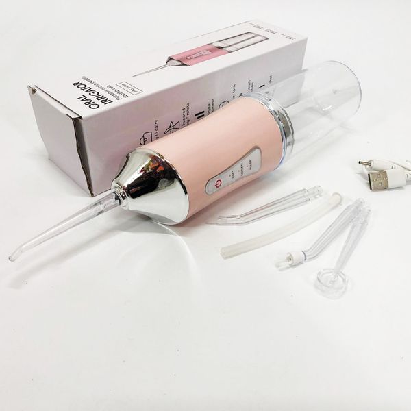 Ирригатор для чистки зубов и полости рта oral irrigator с аккумулятором и сменными насадками. цвет: розовый 00014508 фото
