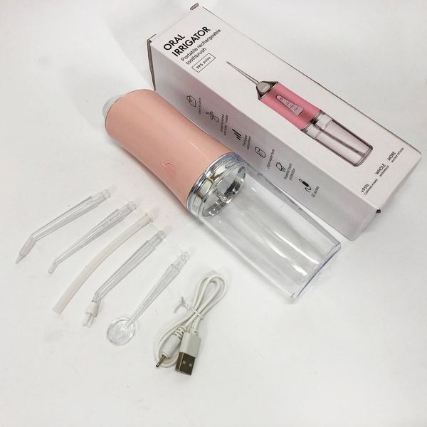Ирригатор для чистки зубов и полости рта oral irrigator с аккумулятором и сменными насадками. цвет: розовый 00014508 фото
