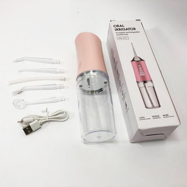 Ирригатор для чистки зубов и полости рта oral irrigator с аккумулятором и сменными насадками. цвет: розовый 00014508 фото