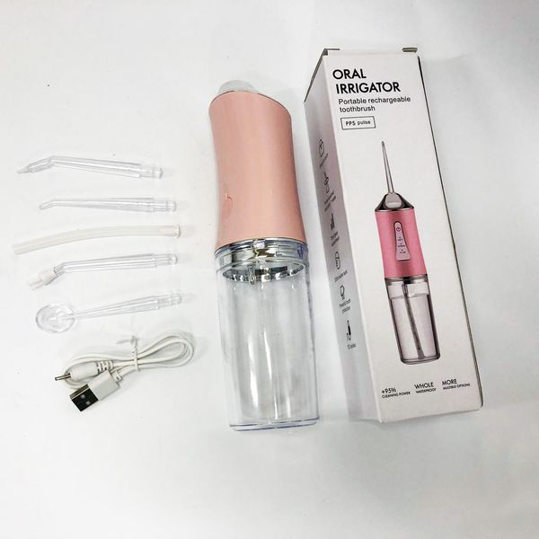 Ирригатор для чистки зубов и полости рта oral irrigator с аккумулятором и сменными насадками. цвет: розовый 00014508 фото