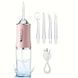 Ирригатор для чистки зубов и полости рта oral irrigator с аккумулятором и сменными насадками. цвет: розовый 00014508 фото 3