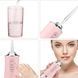 Ирригатор для чистки зубов и полости рта oral irrigator с аккумулятором и сменными насадками. цвет: розовый 00014508 фото 4