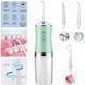Іригатор для чищення зубів та порожнини рота oral irrigator з акумулятором та змінними насадками. колір: зелений 00014509 фото 3