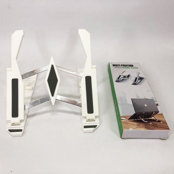 Подставка для ноутбука Multi-Position foldable bracket JC-25 8х22смСтильная подставка. Цвет: белый 00017627 фото