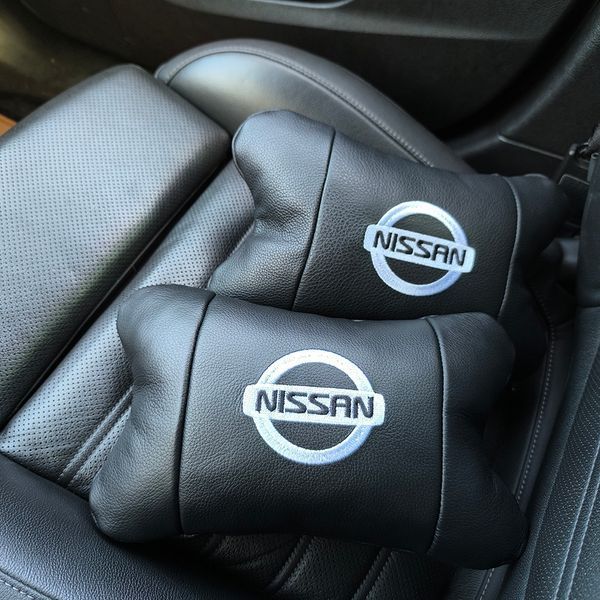 Подушки в авто 2 шт Nissan, натуральная кожа, с логотипом Ниссан, на подголовник для вашей машины 00016804 фото