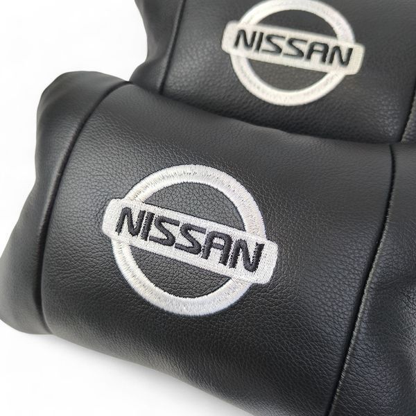 Подушки в авто 2 шт Nissan, натуральная кожа, с логотипом Ниссан, на подголовник для вашей машины 00016804 фото