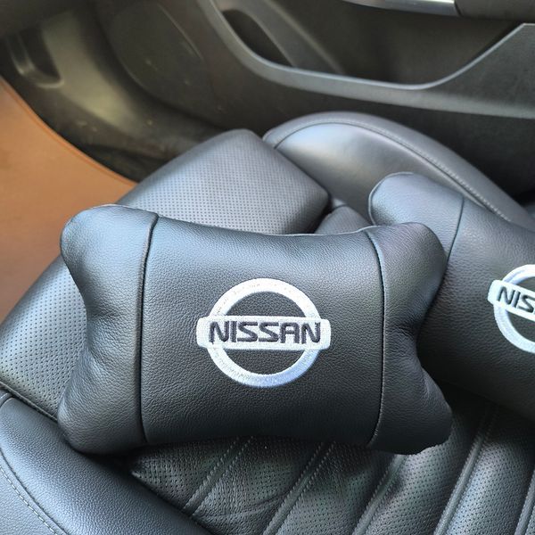 Подушки в авто 2 шт Nissan, натуральная кожа, с логотипом Ниссан, на подголовник для вашей машины 00016804 фото