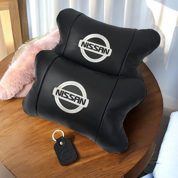 Подушки в авто 2 шт Nissan, натуральная кожа, с логотипом Ниссан, на подголовник для вашей машины 00016804 фото