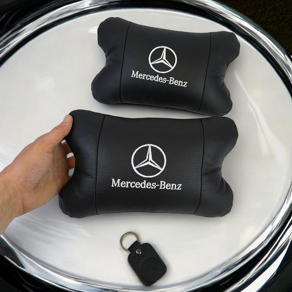 Мерседес 2шт, натуральная кожа, подушки на подголовник для авто с логотипом Mercedes-Benz 00016730 фото